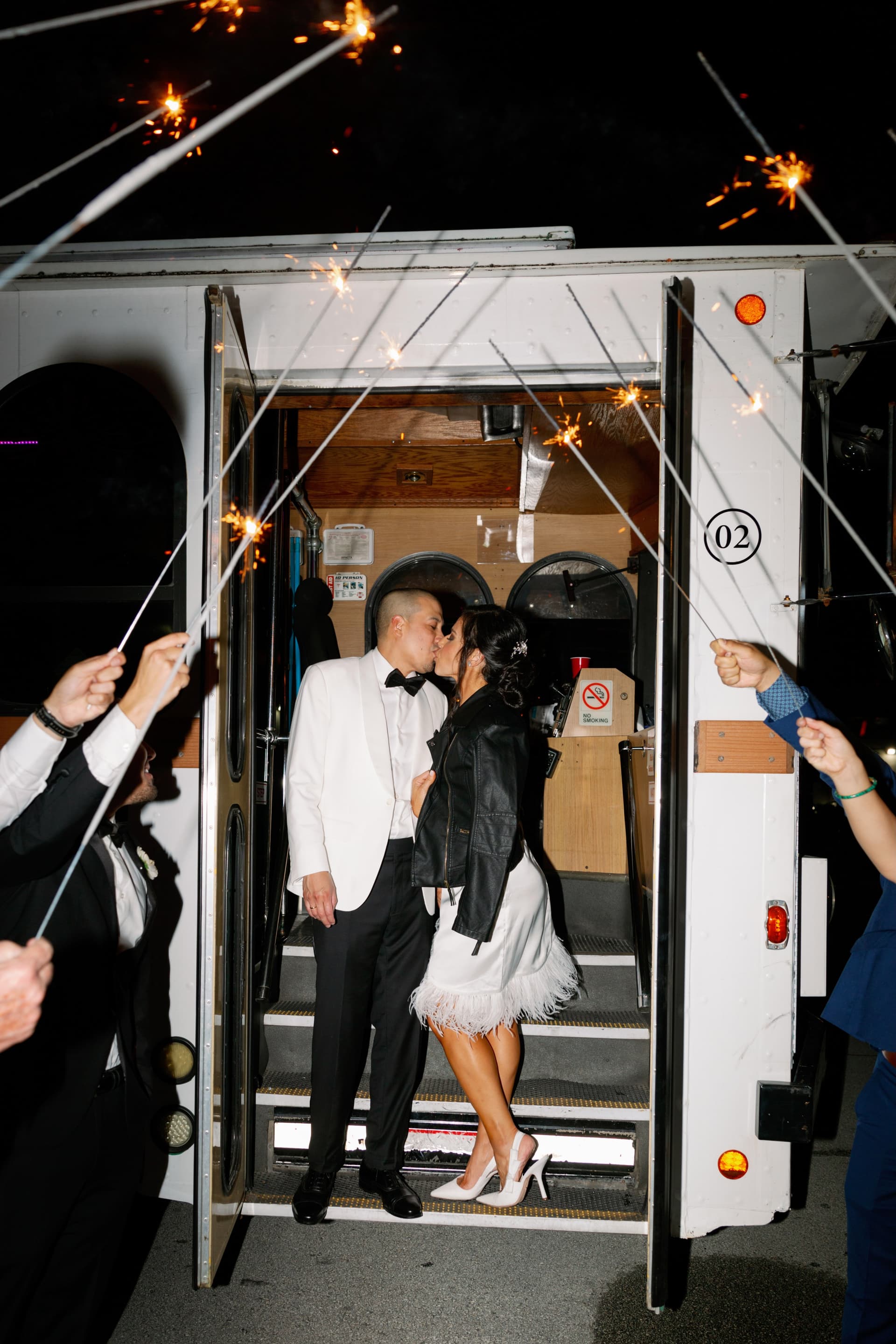 Couple boarding white trolley