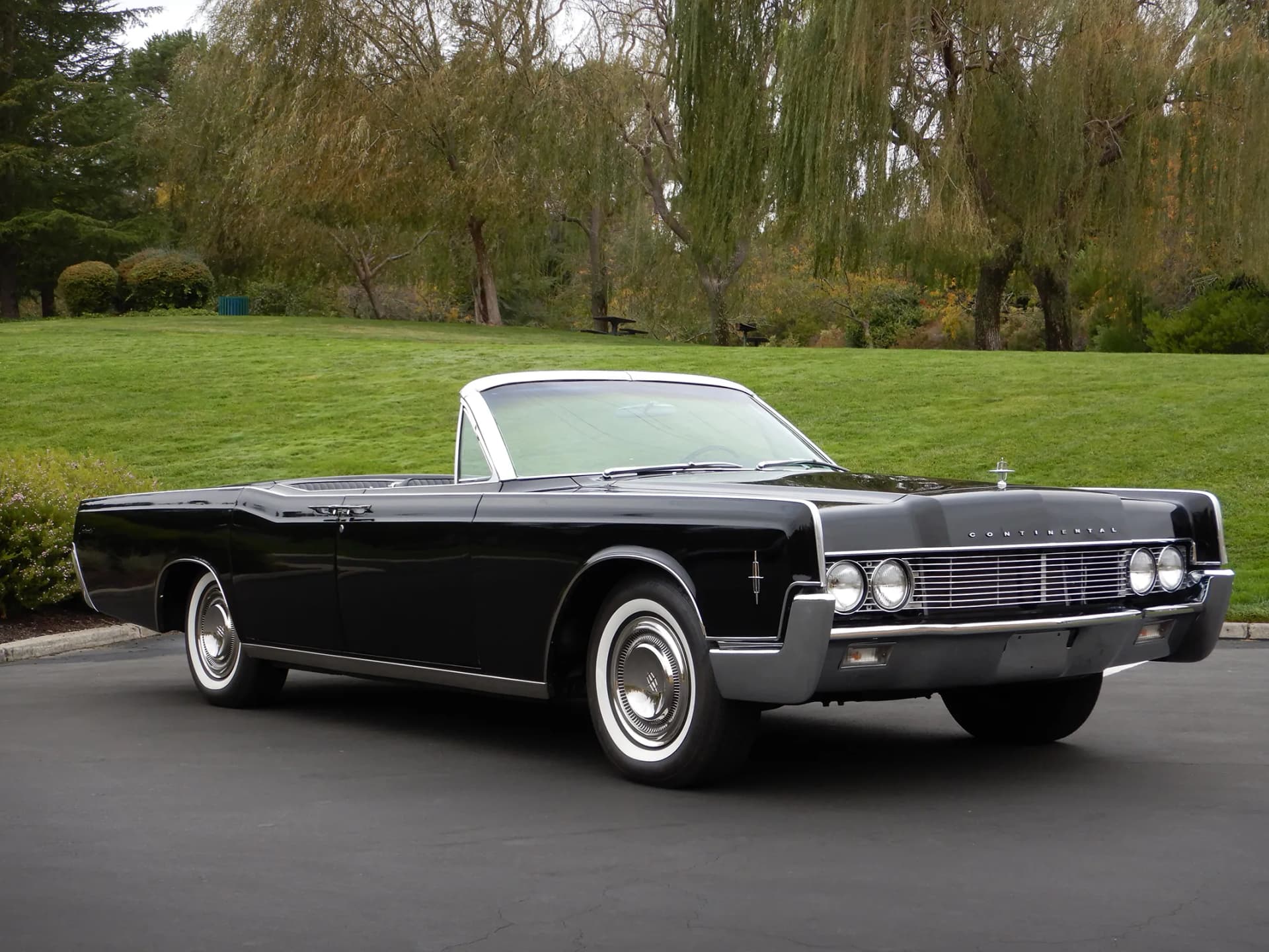 Experience Elegance on Your Special Day with Our 1966 Lincoln Continental Convertible in Miami
